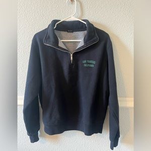 Brandy Melville navy quarter-zip hoodie.